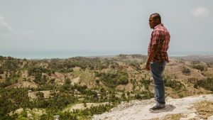 person overlooks haiti